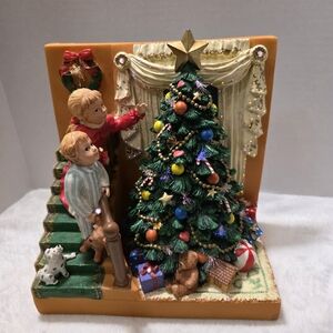 Charming Holiday Decor with Christmas Tree and Children
